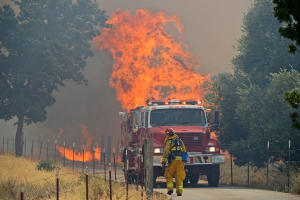 http://www.contracostatimes.com/ci_23578027/pittsburg-firefighters-battle-grass-fire-near-kirker-pass (Jose Carlos Fajardo/Bay Area News Group)